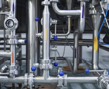 Graphic background image of steel pipeline system at industrial factory workshop, copy space
